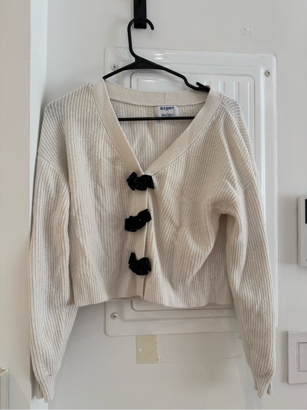 Old Navy Cream V-Neck Cropped Cardigan with Black Bow Accents